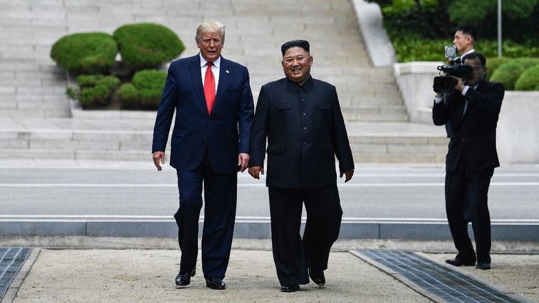 US President Donald Trump meets with North Korean leader Kim Jong Un at the DMZ separating the two Koreas, in Panmunjom. (AFP