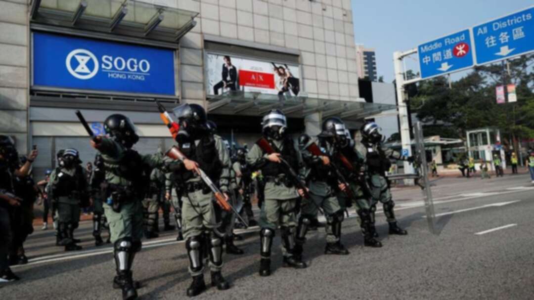 Hong Kong riot police fire pepper spray, clash with protesters at rally