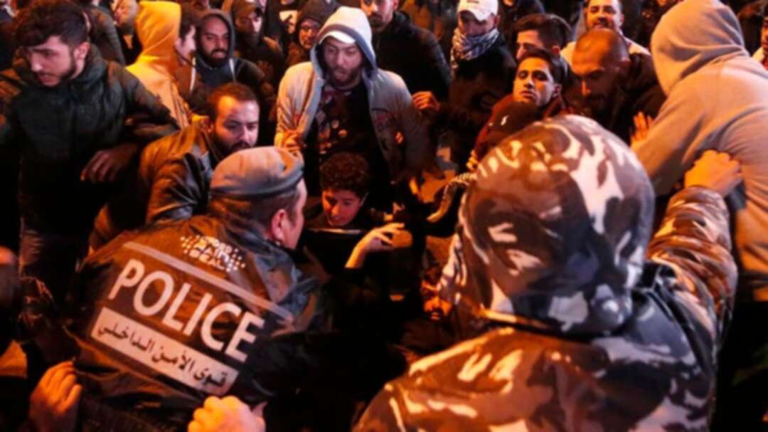 Lebanese protesters block road outside central bank