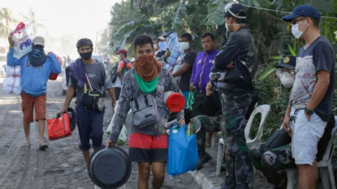 Philippine residents retrieve pets, belongings amid threat of volcano eruption