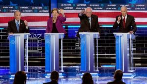 Former NYC Mayor Bloomberg, Senator Warren, Senator Sanders and former VP Biden (L-R) all speak simultaneously at the ninth Democratic 2020 US Presidential debate. (Reuters)