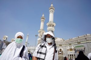 Muslim worshippers wear masks after the noon prayers outside the Grand Mosque, in the Muslim holy city of Mecca, Saudi Arabia on March 7, 2020. (AP)