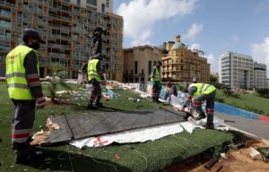 Workers clean the area around Martyrs' Square after Lebanese security forces cleared away a protest camp in Beirut, Lebanon. (Reuters)