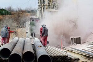 This photo taken on January 20, 2021 shows members of a rescue team working at the site of a gold mine explosion where 22 miners are trapped underground in Qixia, in eastern China's Shandong province. (AFP)