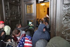 Protesters attempt to enter the U.S. Capitol Building on January 06, 2021 in Washington, DC. Pro-Trump protesters entered the U.S. Capitol building. (AFP)