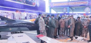 Iranian Armed Forces Chief of Staff Major General Mohammad Bagheri and other top commanders visit Iranian-made military drones, unveiled in an exhibition in Semnan, Iran. (Reuters)