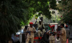 Sudanese soldiers secure the area as Sudan's ex-president Omar al-Bashir leaves the office of the anti-corruption prosecutor in Khartoum. (File photo: Reuters)