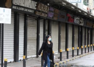 A woman wearing a face mask walks along a street, as Lebanon tightened lockdown and introduced a 24-hour curfew to curb the spread the coronavirus disease (COVID-19) in Beirut, Lebanon. (File photo: Reuters)