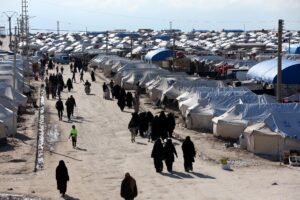 Women walk through al-Hol displacement camp in Hasaka governorate, Syria. (File photo: Reuters)