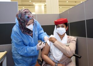 Emirates flight attendant gets the COVID-19 (coronavirus) vaccine in Dubai, United Arab Emirates. (Emirates)