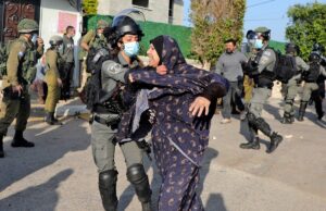 Palestinians clash with Israeli security forces as they prepare to demolish the house of Palestinian Mohammed Cabha in the West Bank village of Tura al-Gharbiya near Jenin, on February 10, 2021. (Jaafar Ashtiyeh/AFP)