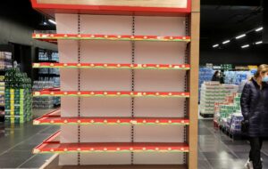 Shoppers walk past an empty shelf at a supermarket in Beirut, Lebanon March 16, 2021. Picture taken March 16, 2021. (File photo: Reuters)