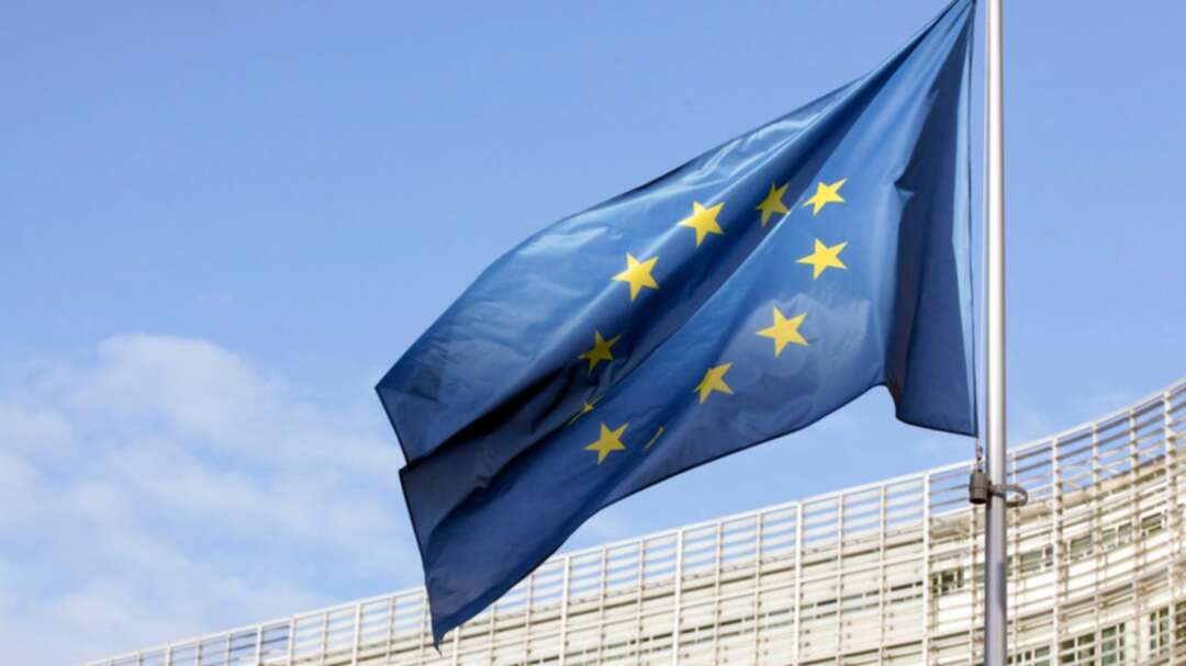 A flag of the European Union can be seen fluttering outside the European commission headquarters in Brussels. (File photo: AFP)