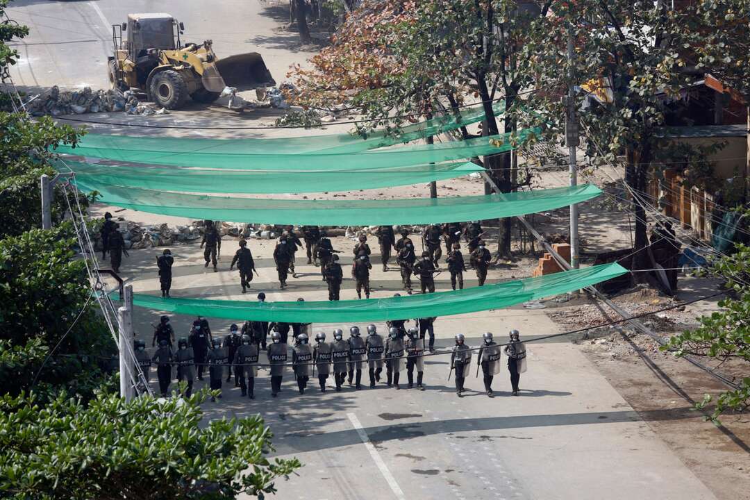 Myanmar forces fire tear gas, stun grenades on protest as UN envoy calls for action