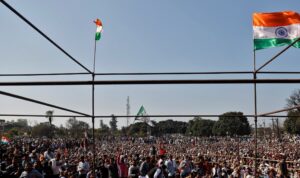 People attend a Maha Panchayat or grand village council meeting as part of a farmers' protest against farm laws at Bhainswal in Shamli district in the northern state of Uttar Pradesh, India, February 5, 2021. (Reuters)