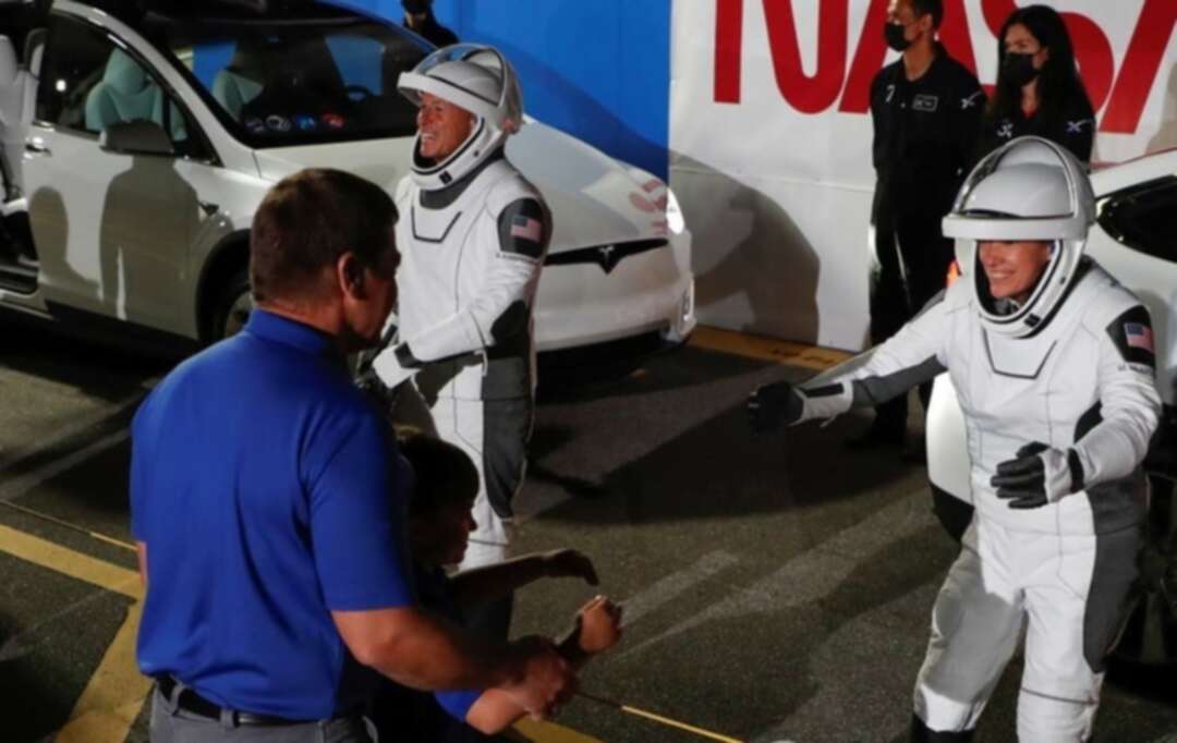 Astronauts arrive at pad for SpaceX flight on used rocket