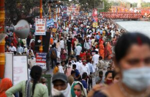 Devotees are seen on the banks of the Ganges river during Kumbh Mela, or the Pitcher Festival, amidst the spread of the coronavirus disease (COVID-19), in Haridwar, India, April 12, 2021. (Reuters)