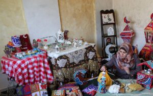 Palestinian Hanan Al-Madhoon makes decorations for sale ahead of the holy fasting month of Ramadan, at Beach refugee camp in Gaza City. (Reuters)