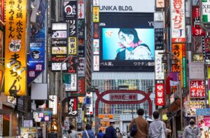 Passersby wearing protective masks stroll through Kabukicho entertainment district during the COVID-19 pandemic in Tokyo, Japan April 6, 2021. Picture taken April 6, 2021. (File Photo: Reuters)