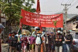 This handout from Kachinwaves taken and received on April 5, 2021 shows protesters taking part in a demonstration against the military coup in Hpakant in Myanmar's Kachin state.