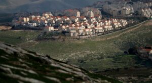 A picture taken from the E1 corridor, a super-sensitive area of the occupied West Bank, shows Israeli settlement of Maale Adumim in the background on February 25, 2020. (AFP)