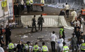 Medics and rescue workers attend to the Lag B'Omer event in Mount Meron, northern Israel, where fatalities were reported among the thousands of ultra-Orthodox Jews gathered at the tomb of a 2nd-century sage for annual commemorations that include all-night prayer and dance, at Mount Meron, Israel April 30, 2021. (Reuters)