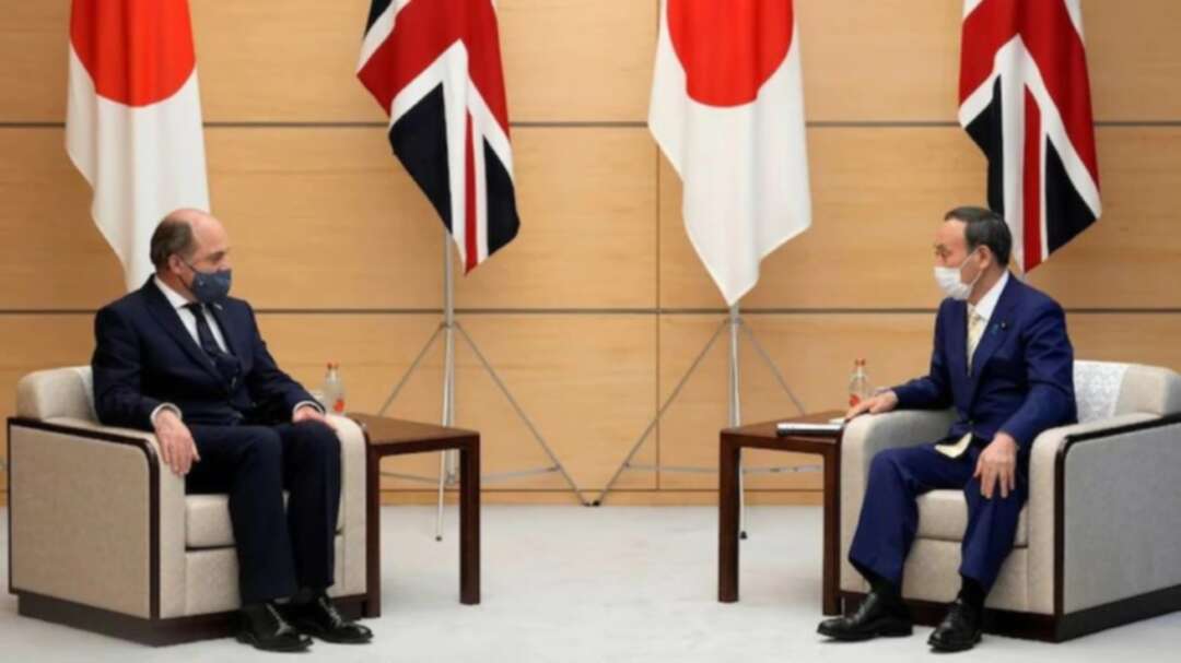 Britain's Defence Secretary Ben Wallace listens to Japan's Prime Minister Yoshihide Suga at the start of their meeting at the prime minister's official residence in Tokyo, Japan on July 20, 2021. (Photo: REUTERS)