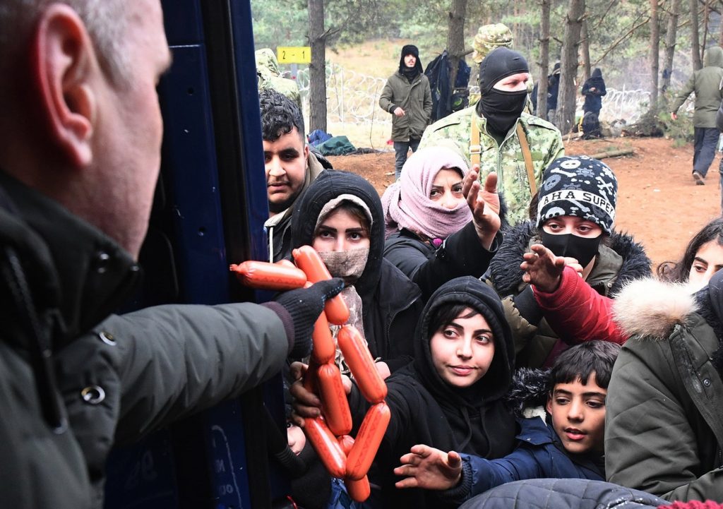 Asylum seekers at Belarus border receiving humanitarian aid/Facebook page