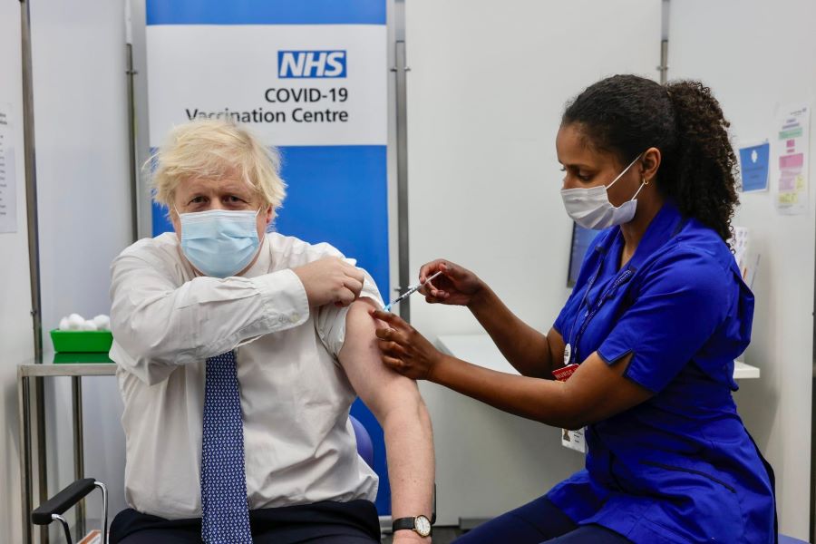 UK Prime Minister taking booster shot/Official Facebook page