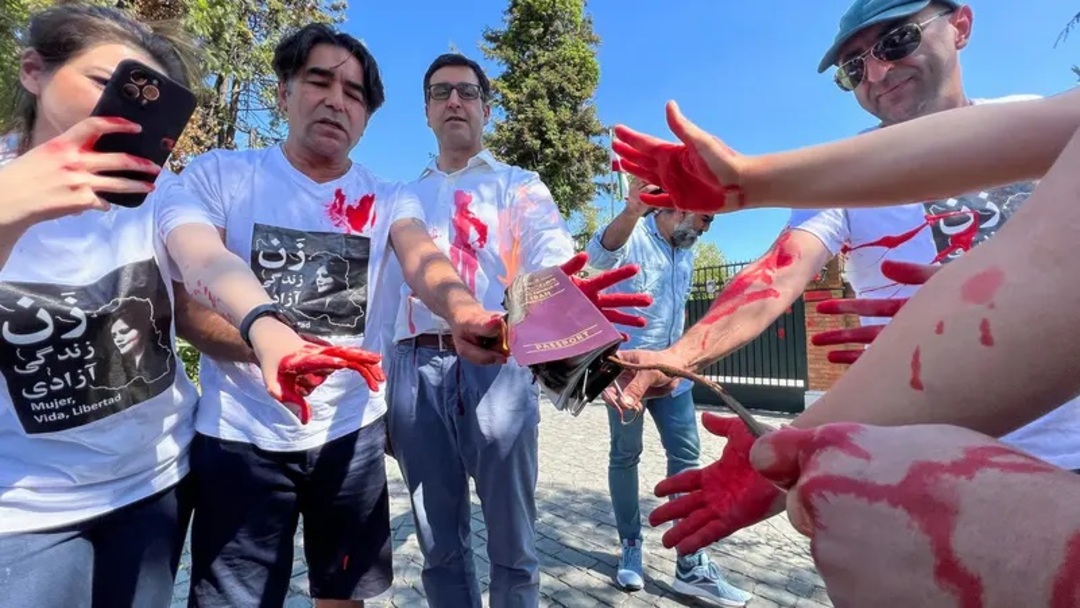 Iranians burn passports outside embassy in Chile protesting Mahsa Amini’s death