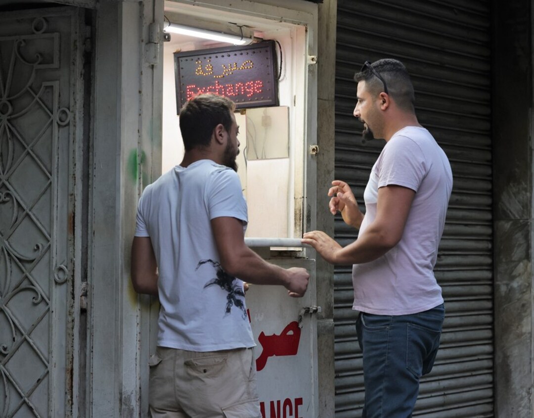 Lebanon to shut banks after string of raids by people taking out life savings